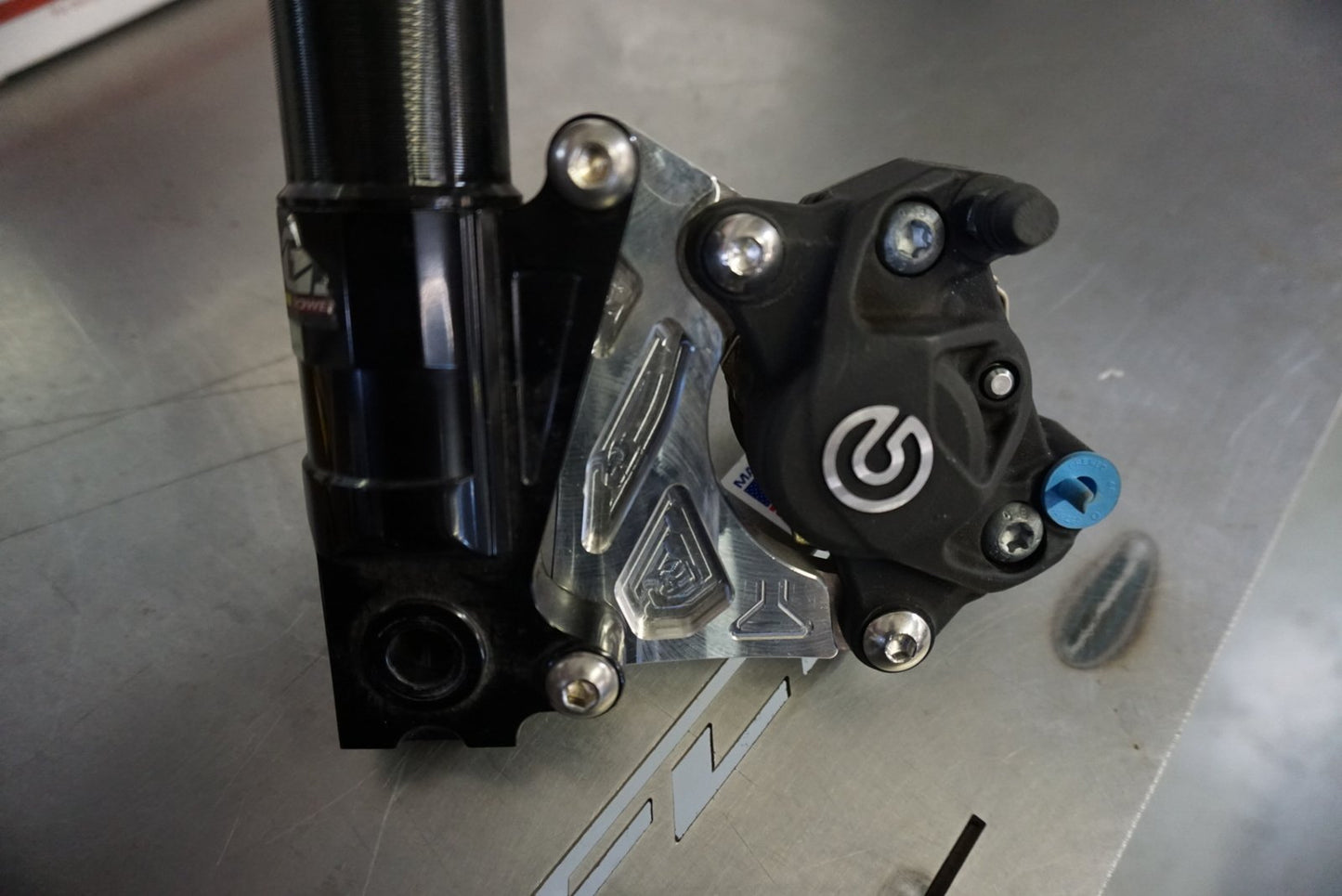 Honda Ruckus Parts | FLP Brembo P32 Caliper Adapter