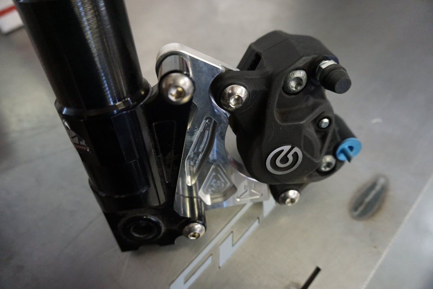 Honda Ruckus Parts | FLP Brembo P32 Caliper Adapter